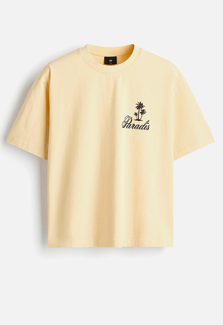 H&M - Relaxed fit printed cotton T-shirt - light yellow/paradis