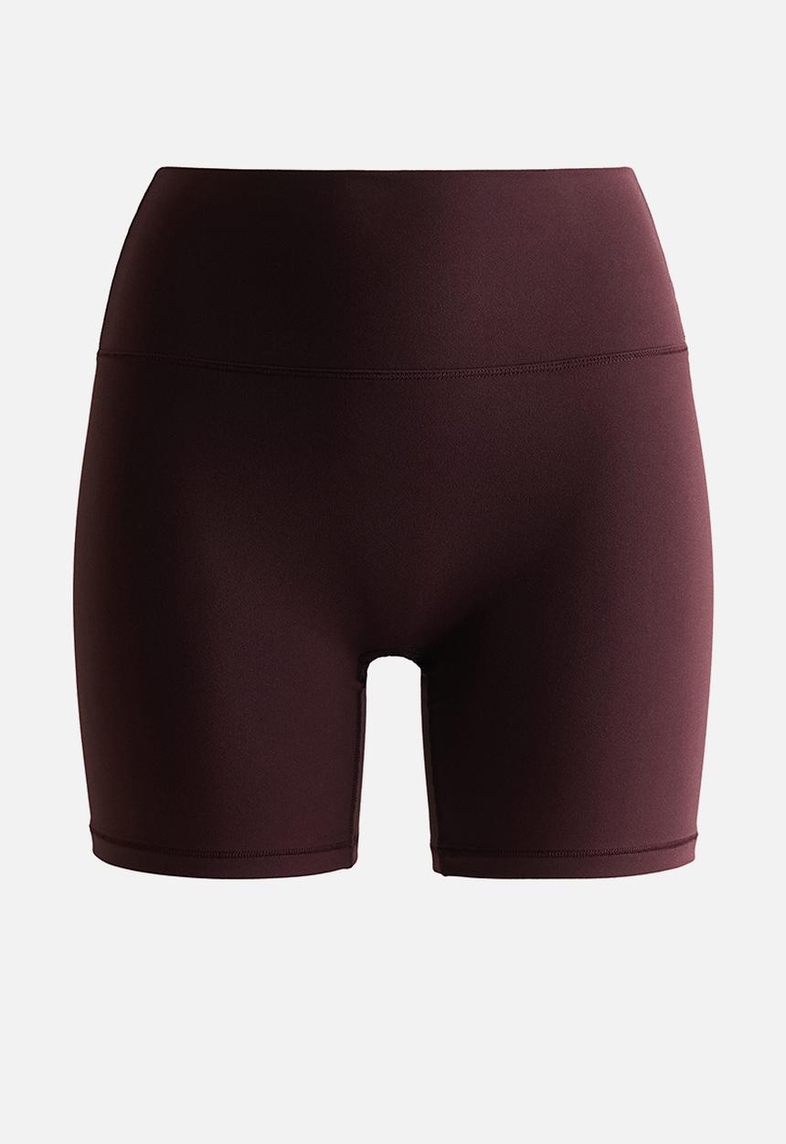H&M - Sports cycling shorts with softmove? - chocolate plum