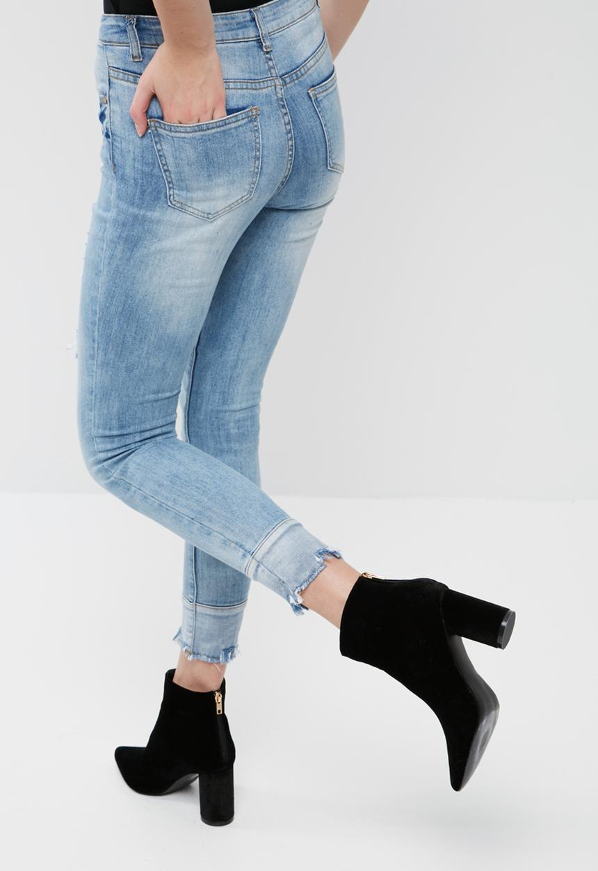 Missguided - Anarchy mid rise reversed hem skinny jeans