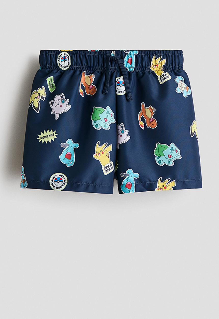 H&M - Printed swim shorts - navy blue/pokemon