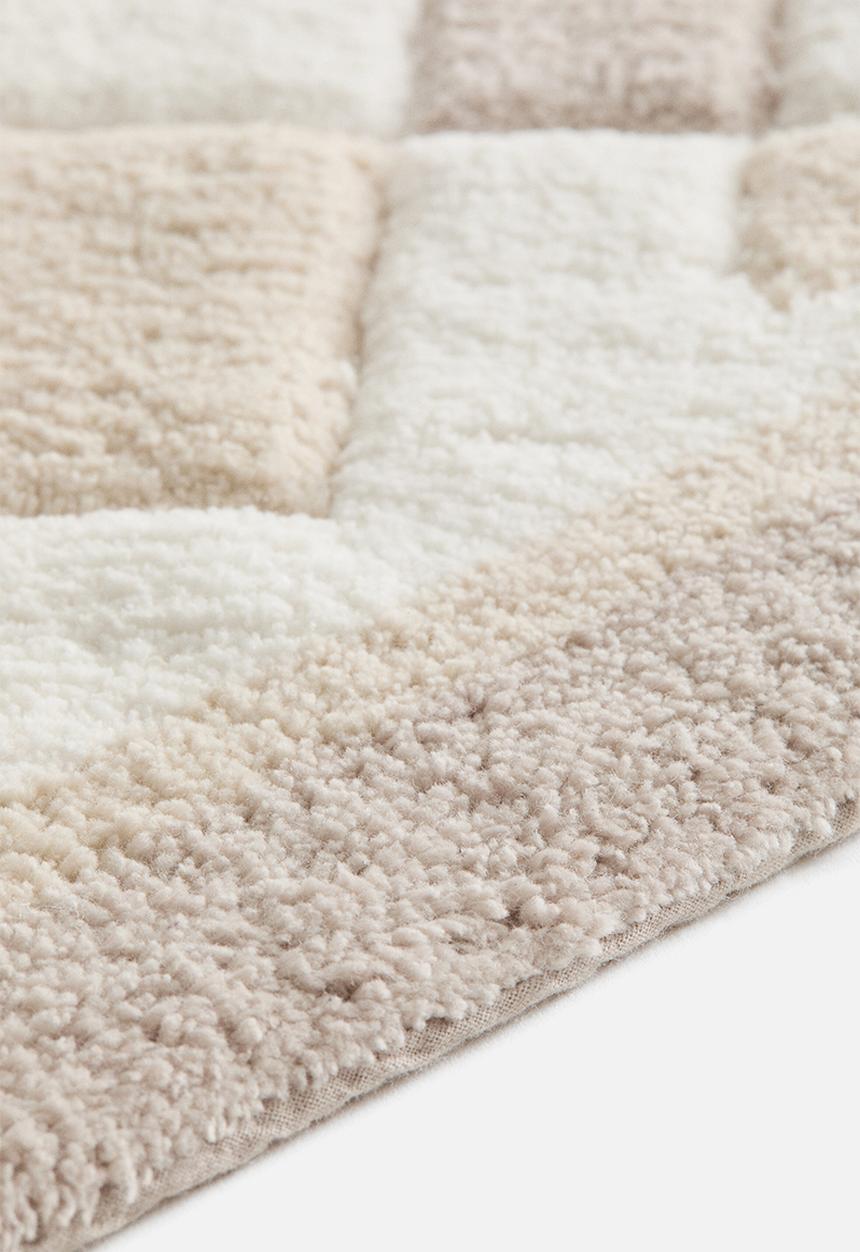 H&M - Tufted cotton bath mat - beige/white