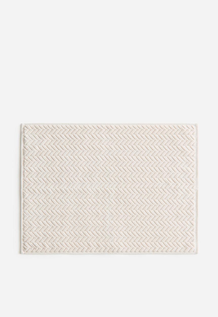 H&M - Textured bath mat - cream