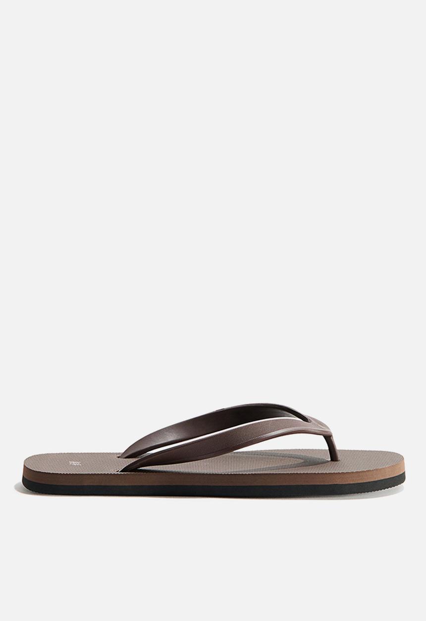 H&M - Rubber flip flops - dark brown
