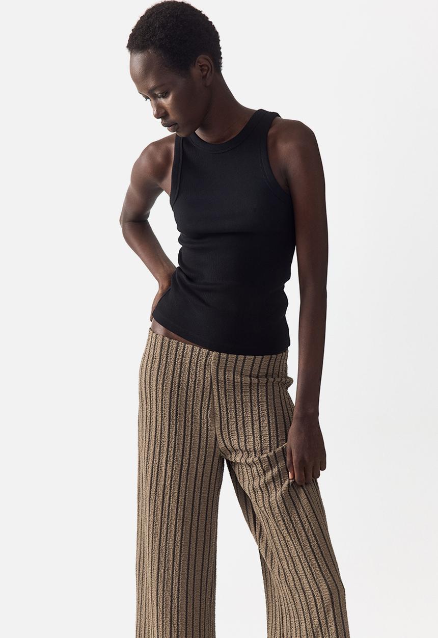 H&M - Wide crinkled trousers - dark mole/striped
