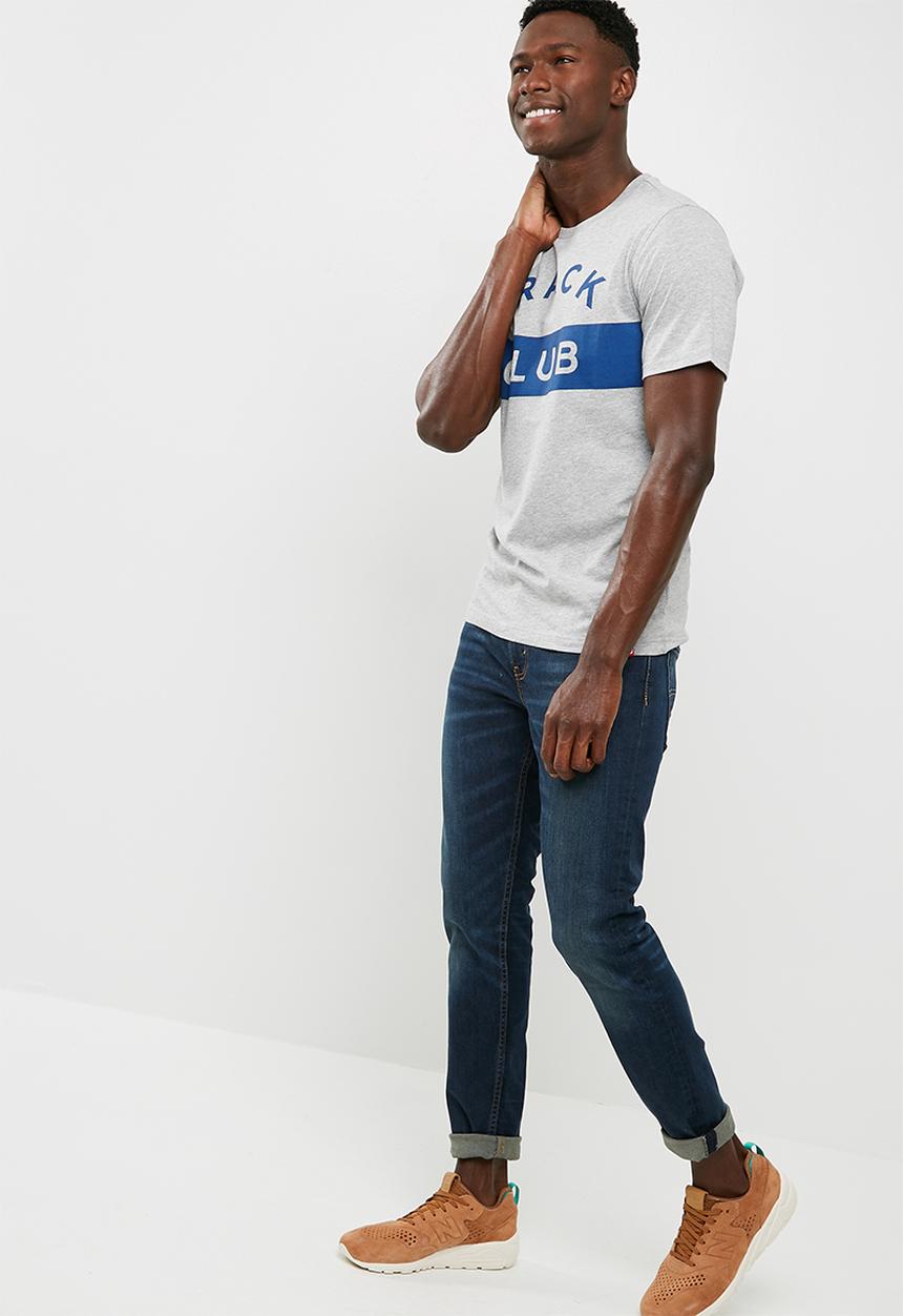 New Balance  - Essentials track club tee