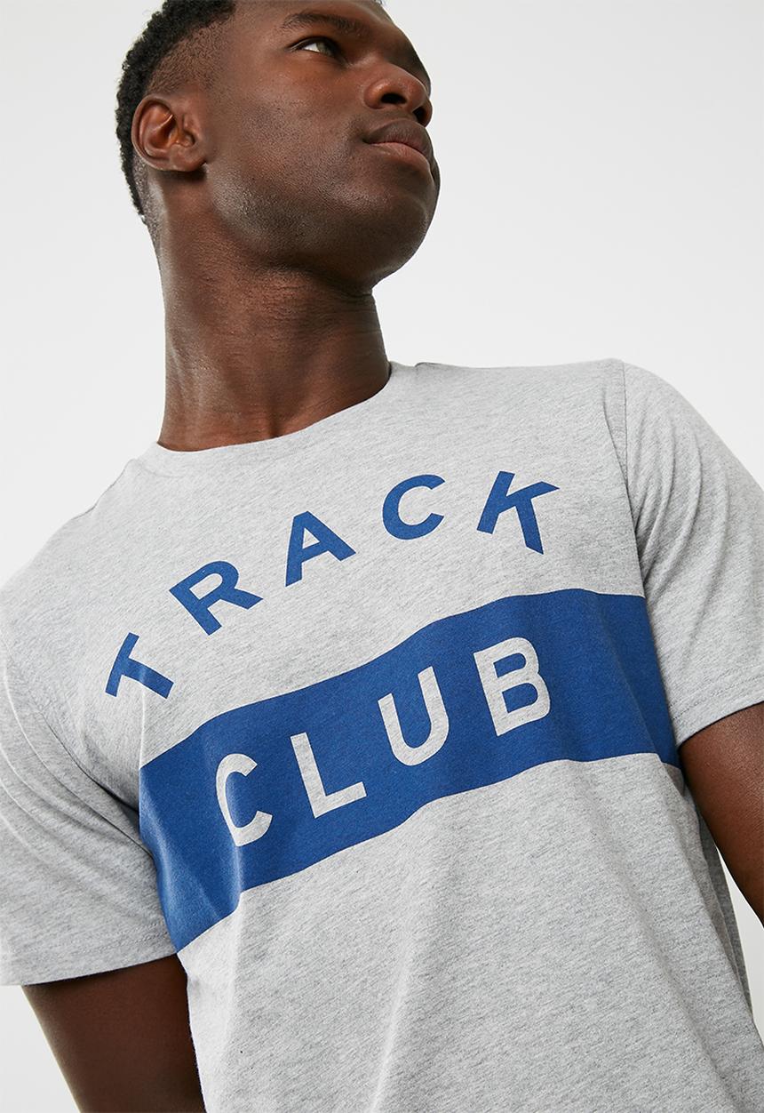 New Balance  - Essentials track club tee