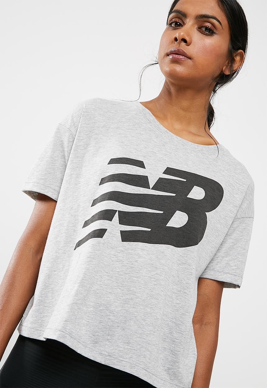New Balance  - Essentials track club tee