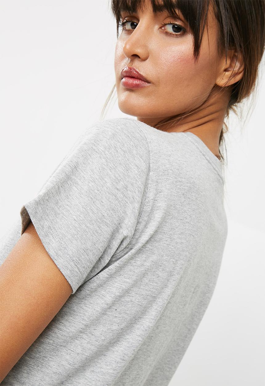 New Balance  - Stripe logo tee