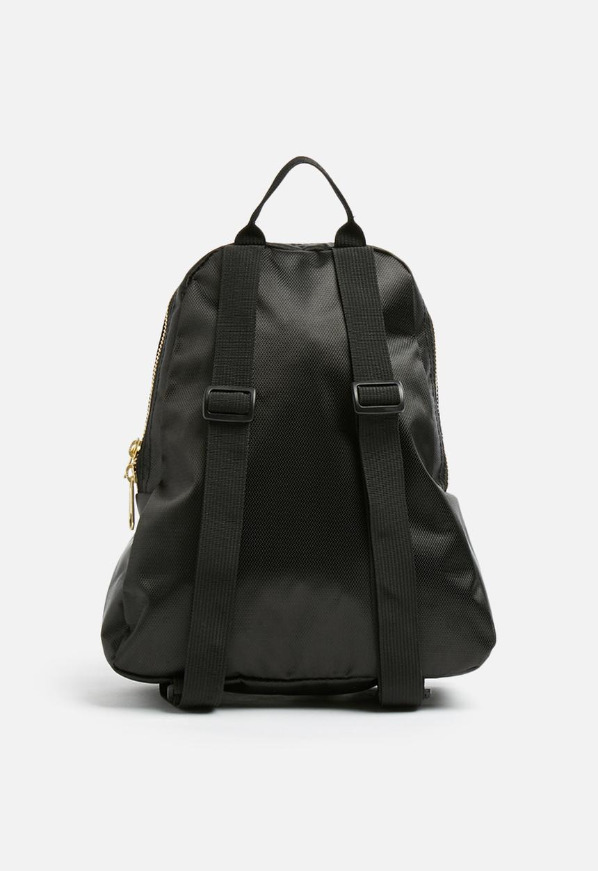 JanSport - Half pint FX - black/gold