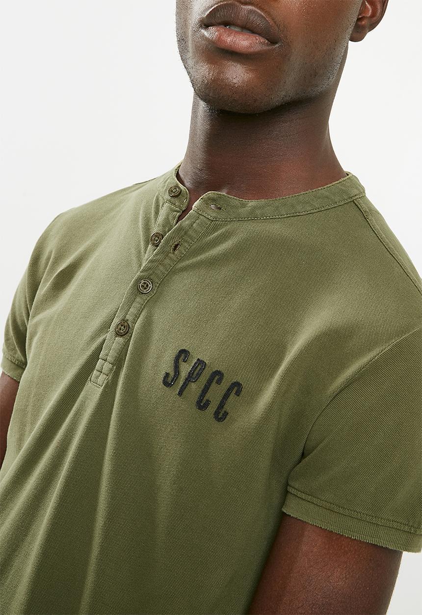 S.P.C.C - Overdyed pique golfer - green 