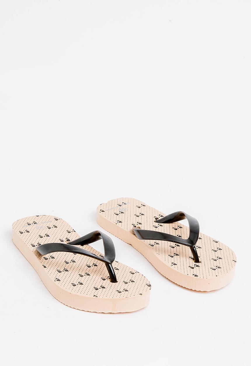 Pop Candy - Printed flip flops - beige & black 