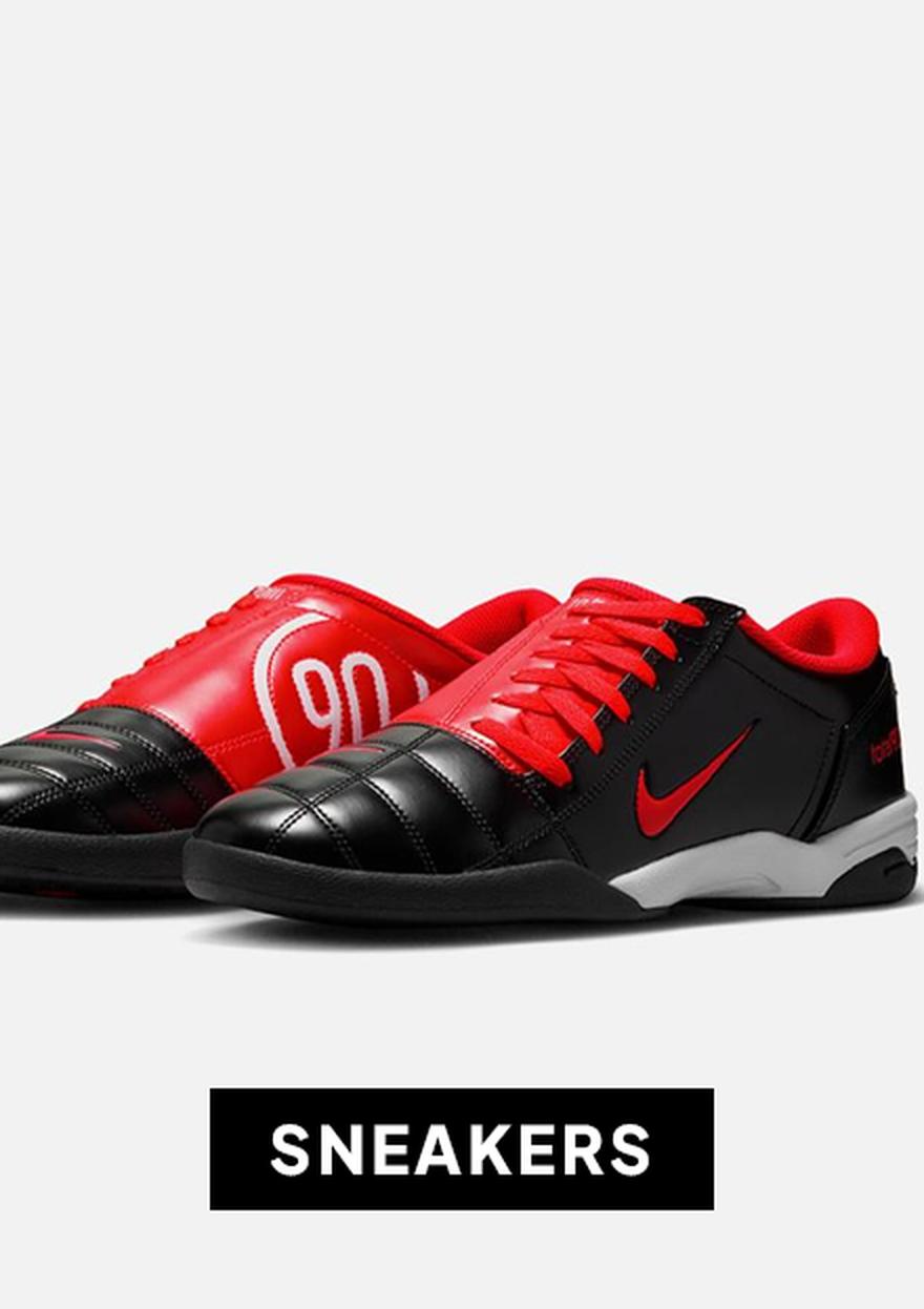 Black and red Nike sneakers on a white background with a bold “SNEAKERS” label below.