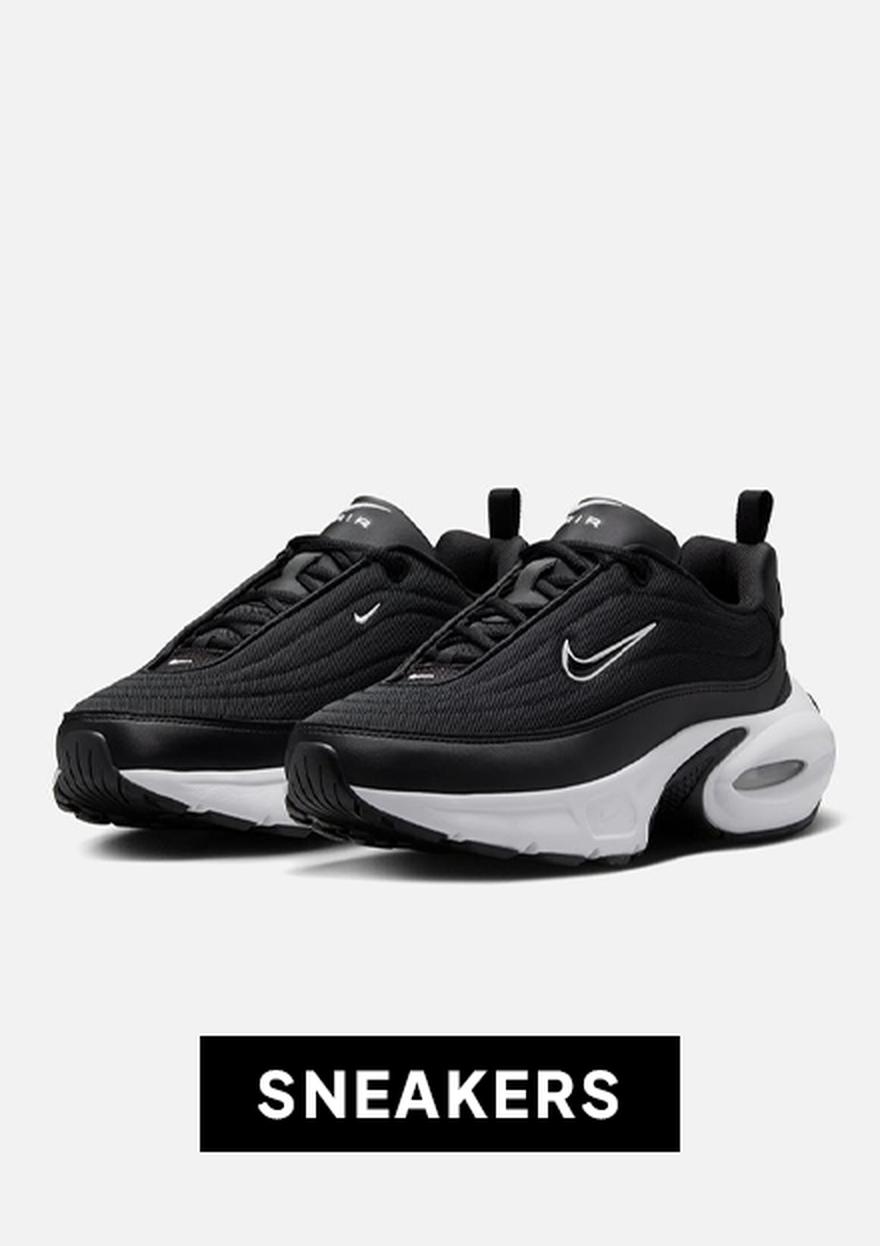 Black Nike sneakers on a white background with a bold “SNEAKERS” label below.