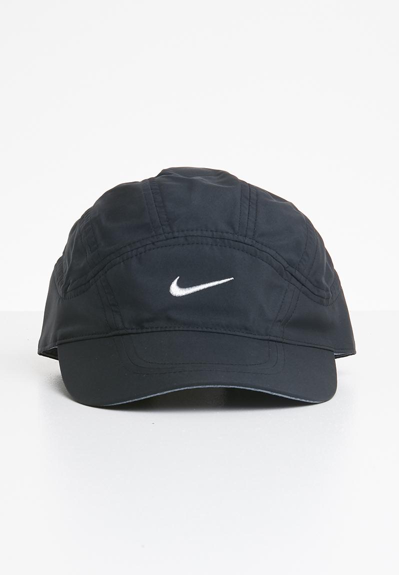 nike cap on head