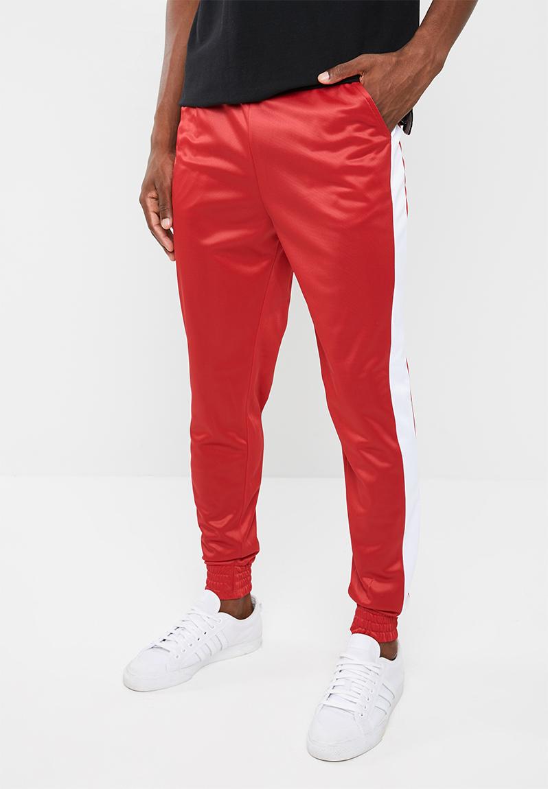 pants with red and white stripe