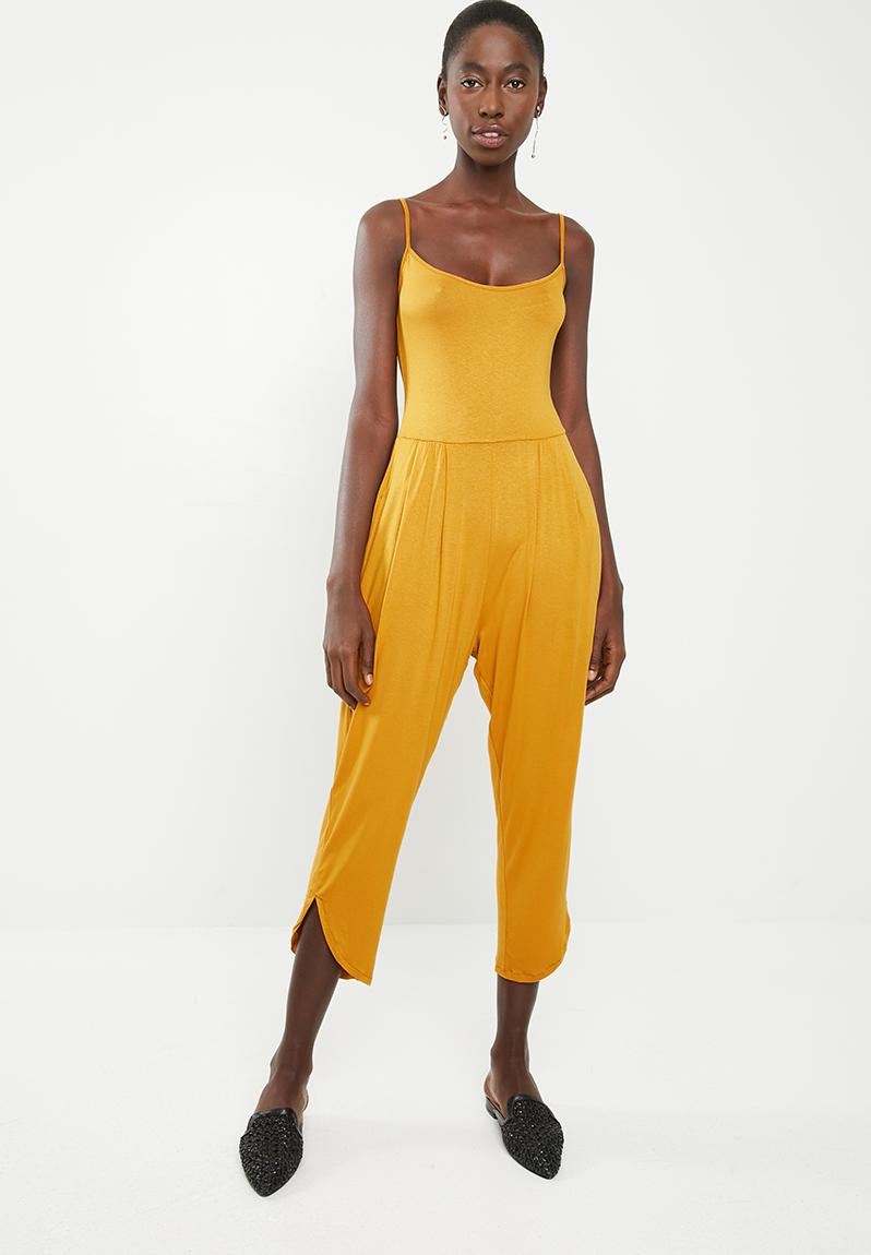 Strappy yoga jumpsuit with pockets at the hip - mustard Superbalist ...