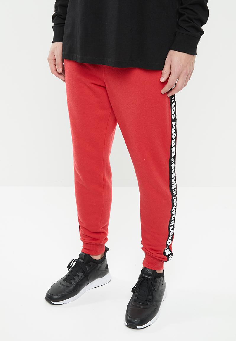 Trippy slim trackie - red/black Cotton On Pants & Chinos | Superbalist.com