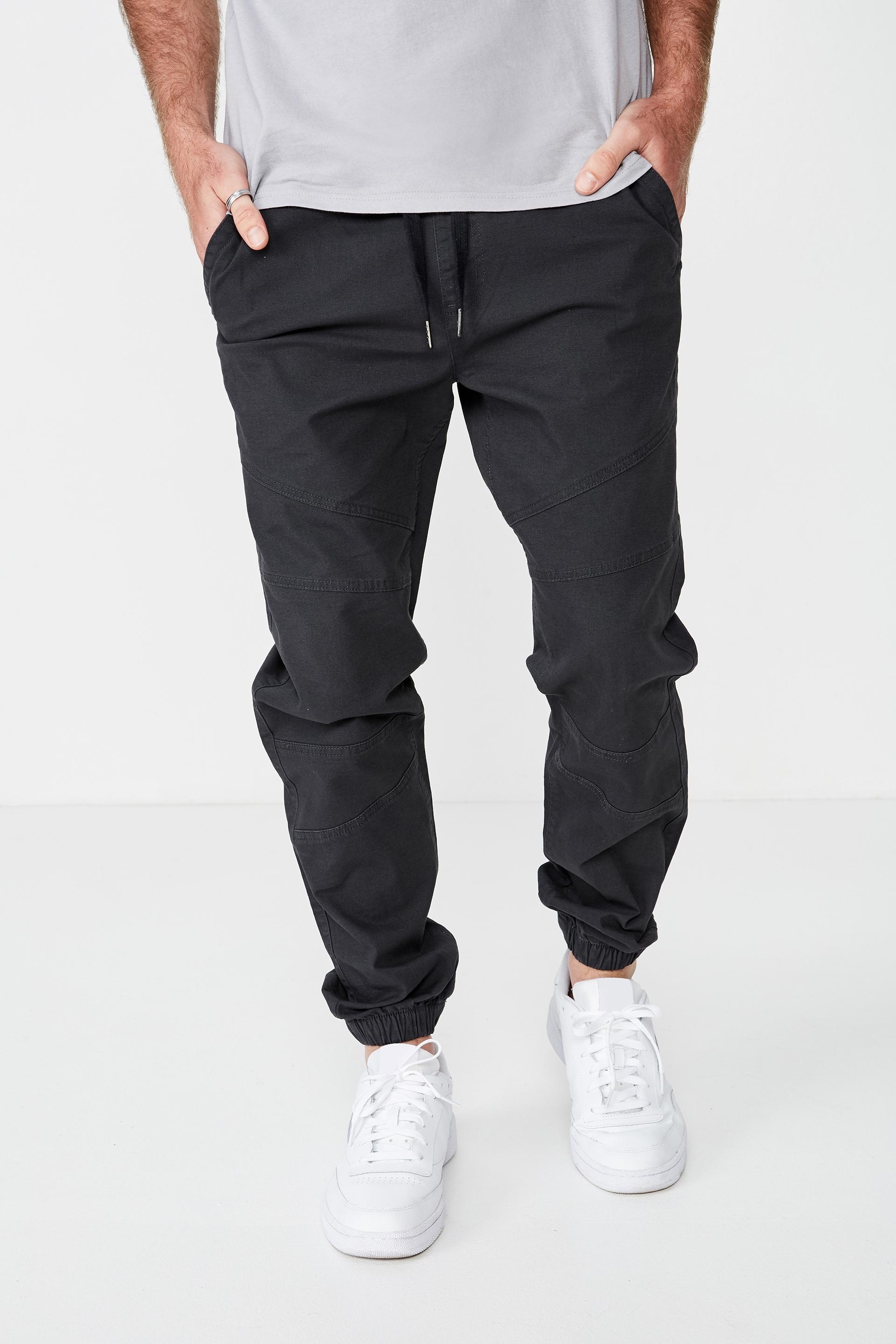 black cuffed track pants