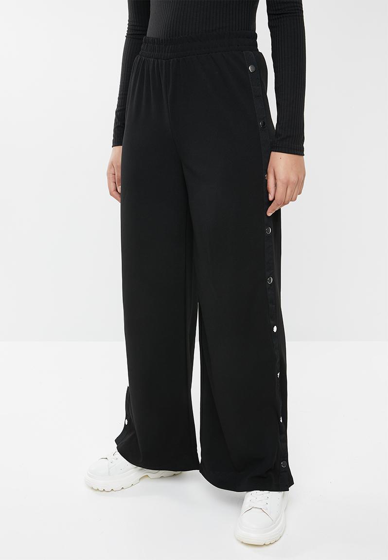 Wide leg trousers with side buttons - black Forever21 Trousers ...