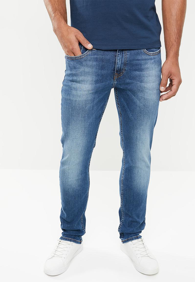 Slim straight - whip mid wash blue GUESS Jeans | Superbalist.com