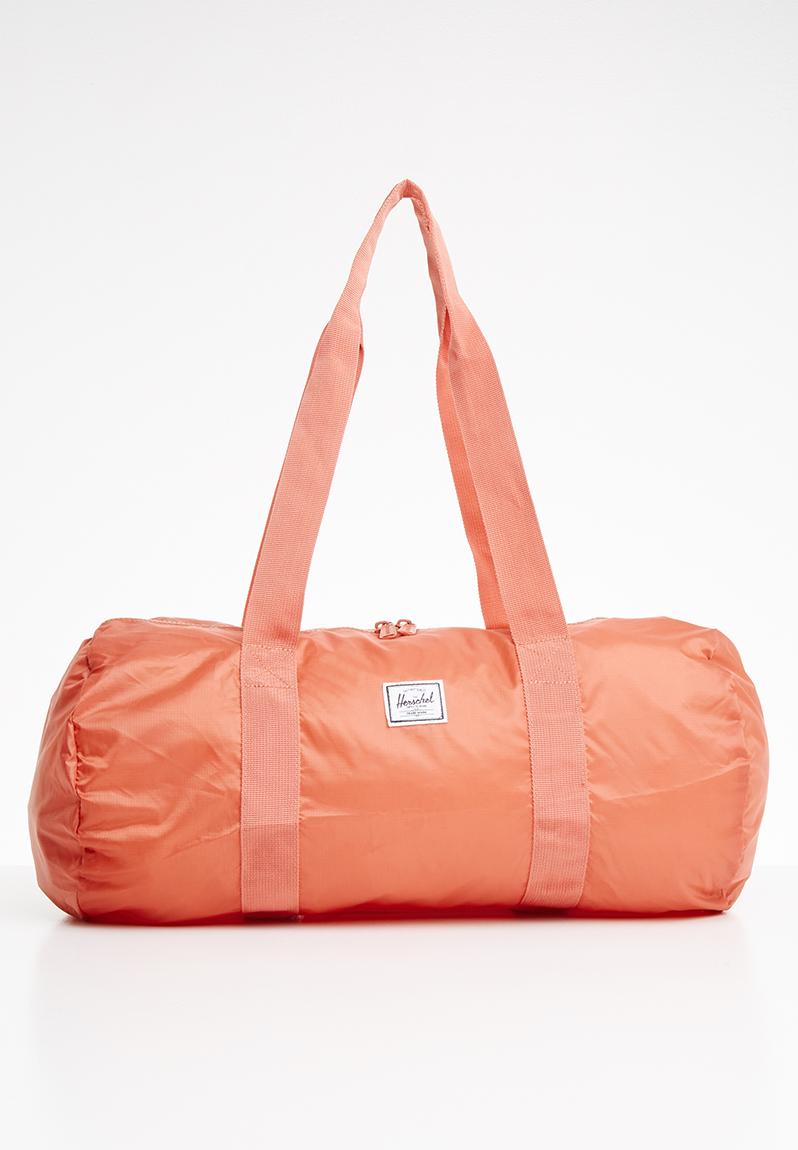 Packable duffle bag - peach HERSCHEL Bags & Purses | Superbalist.com