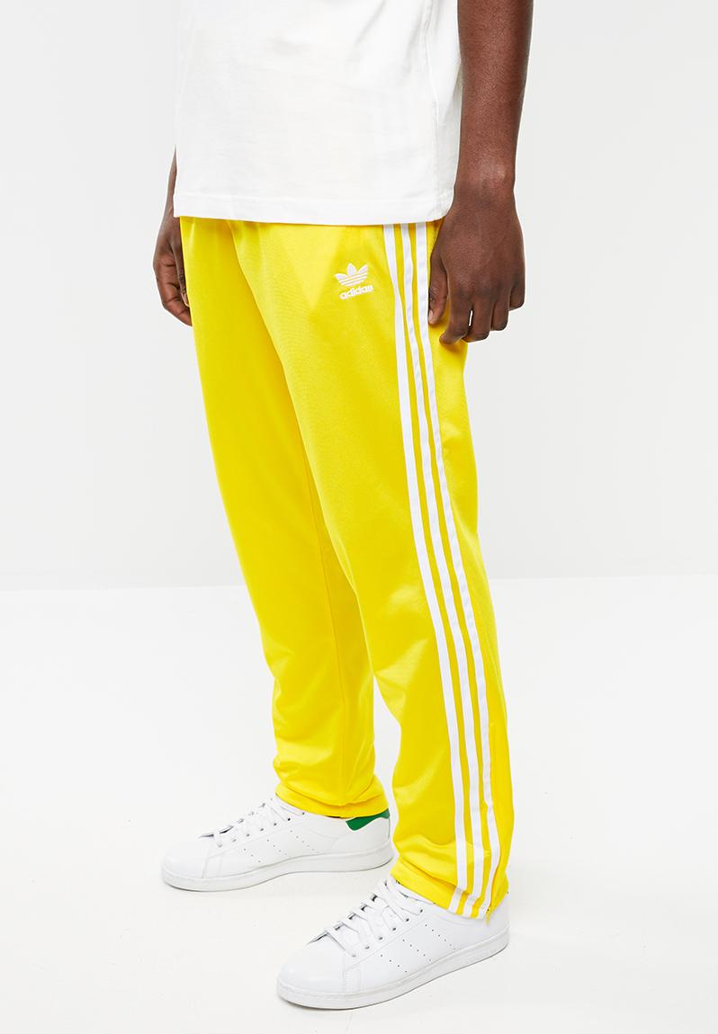 Firebird track pant - yellow adidas Originals Sweatpants & Shorts ...