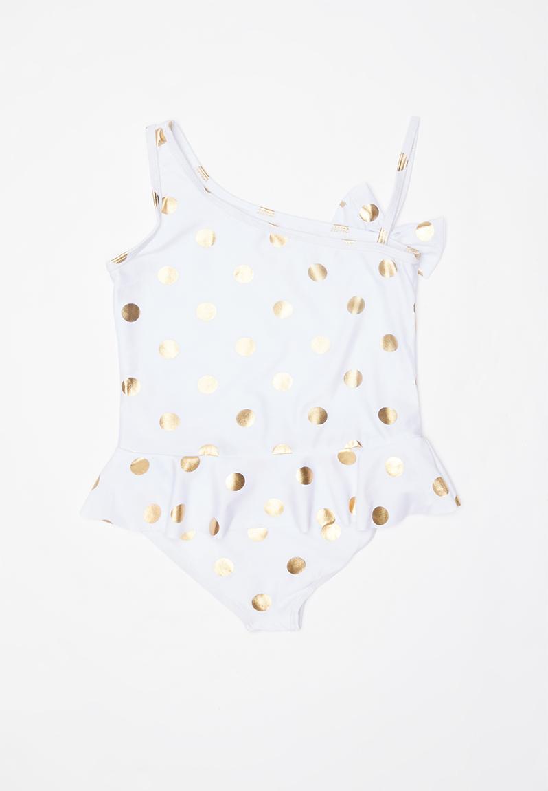 white and gold swimwear