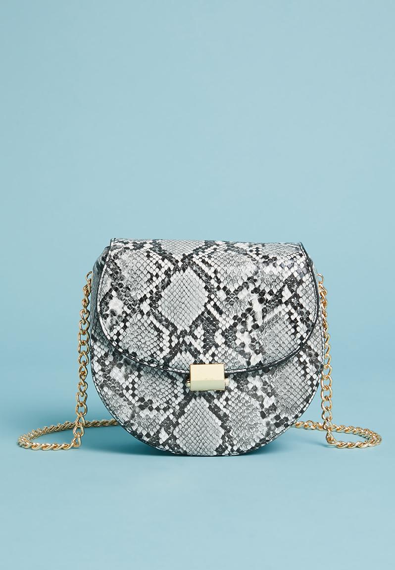 black and white snake print bag