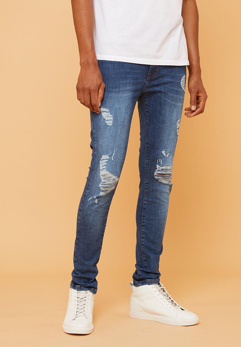 Skinny rip & repair jeans - mid wash blue Superbalist Jeans ...