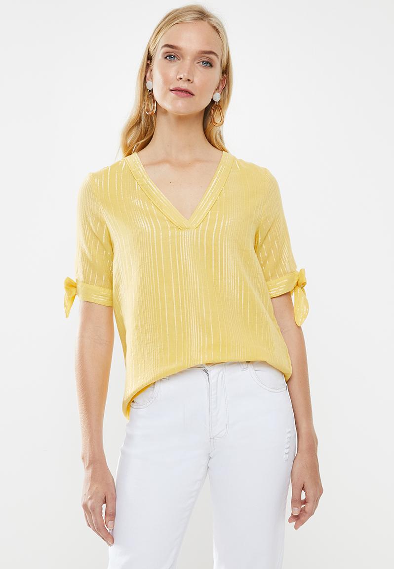 yellow v neck top