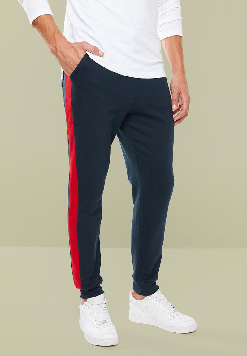Skinny side stripe sweatpants - navy Superbalist Pants & Chinos ...
