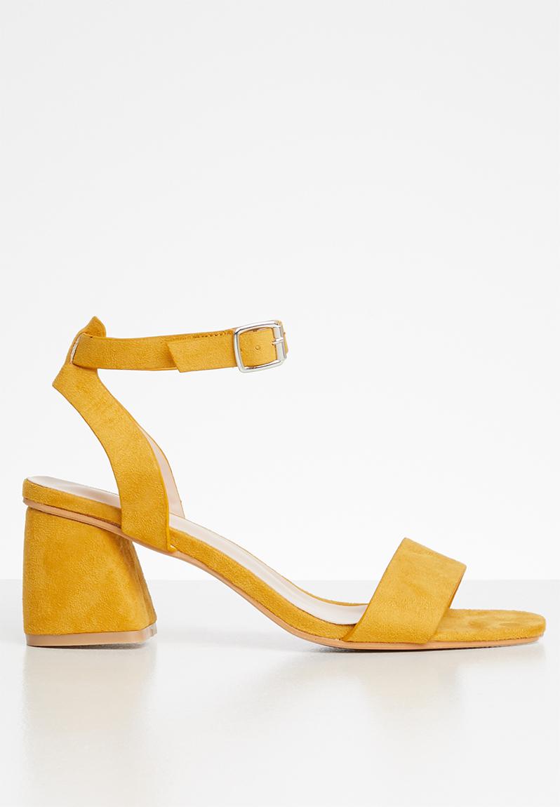 block heel yellow shoes