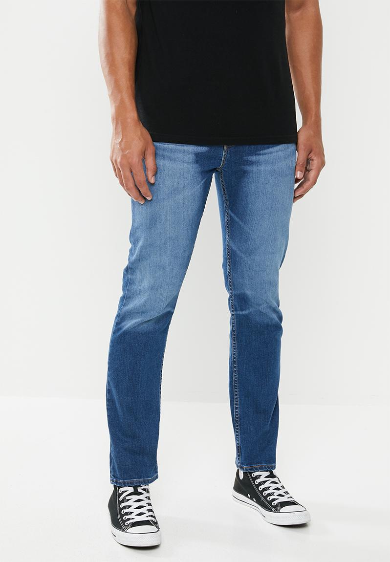 502 tapered jeans - goldenrod tint overt Levi’s® Jeans | Superbalist.com