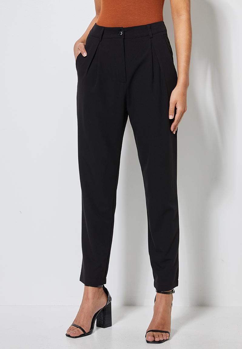 Tapered trouser with pleat detail - black Superbalist Trousers ...