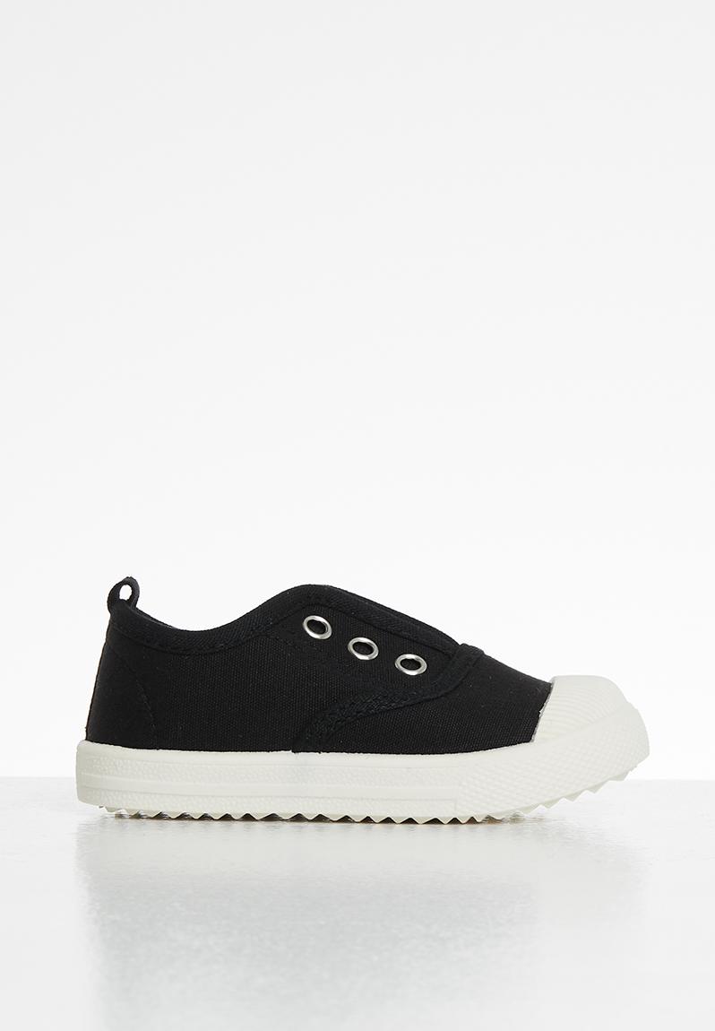 black laceless sneakers