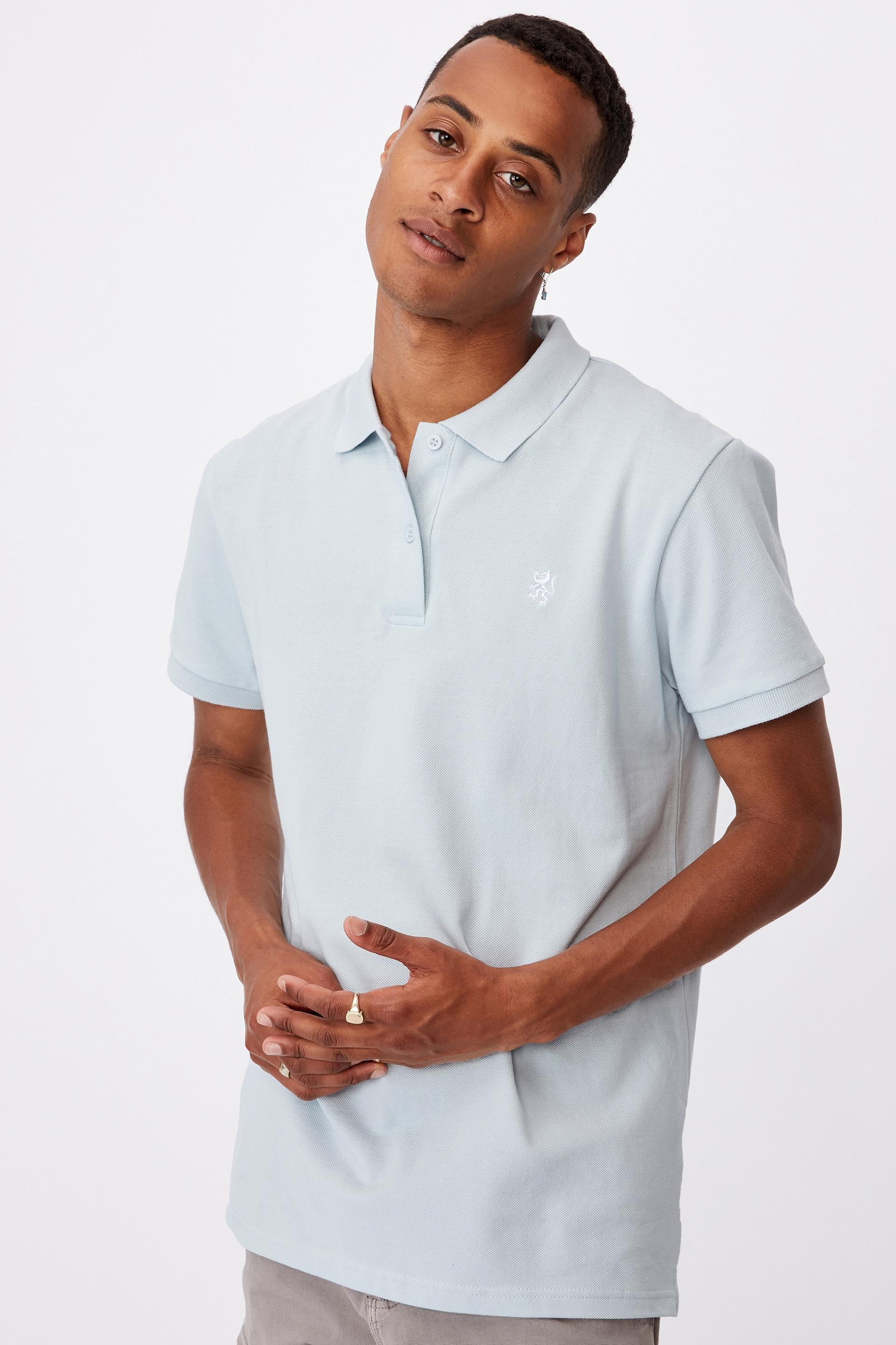 Essential short sleeve polo - light blue Cotton On T-Shirts & Vests ...