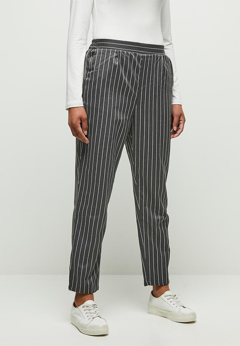 multicoloured striped trousers