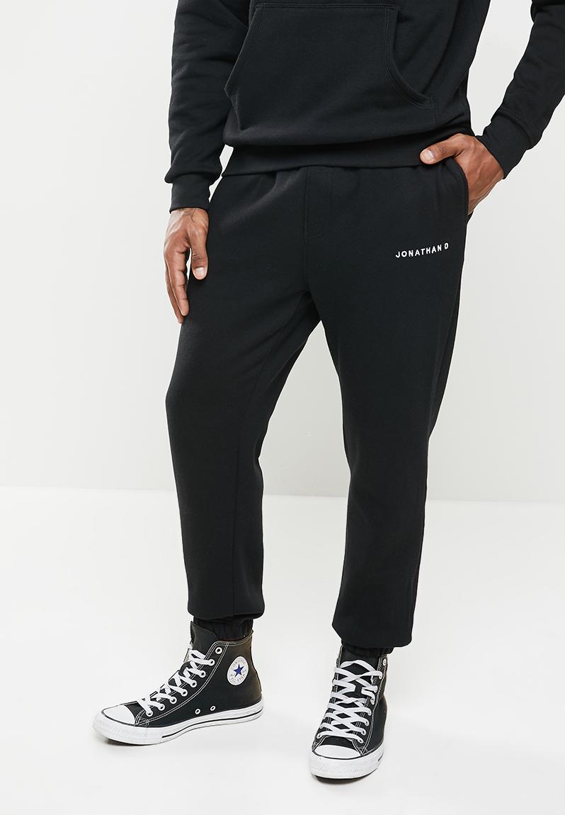 Brand regular fit sweatpants - black Jonathan D Pants & Chinos ...