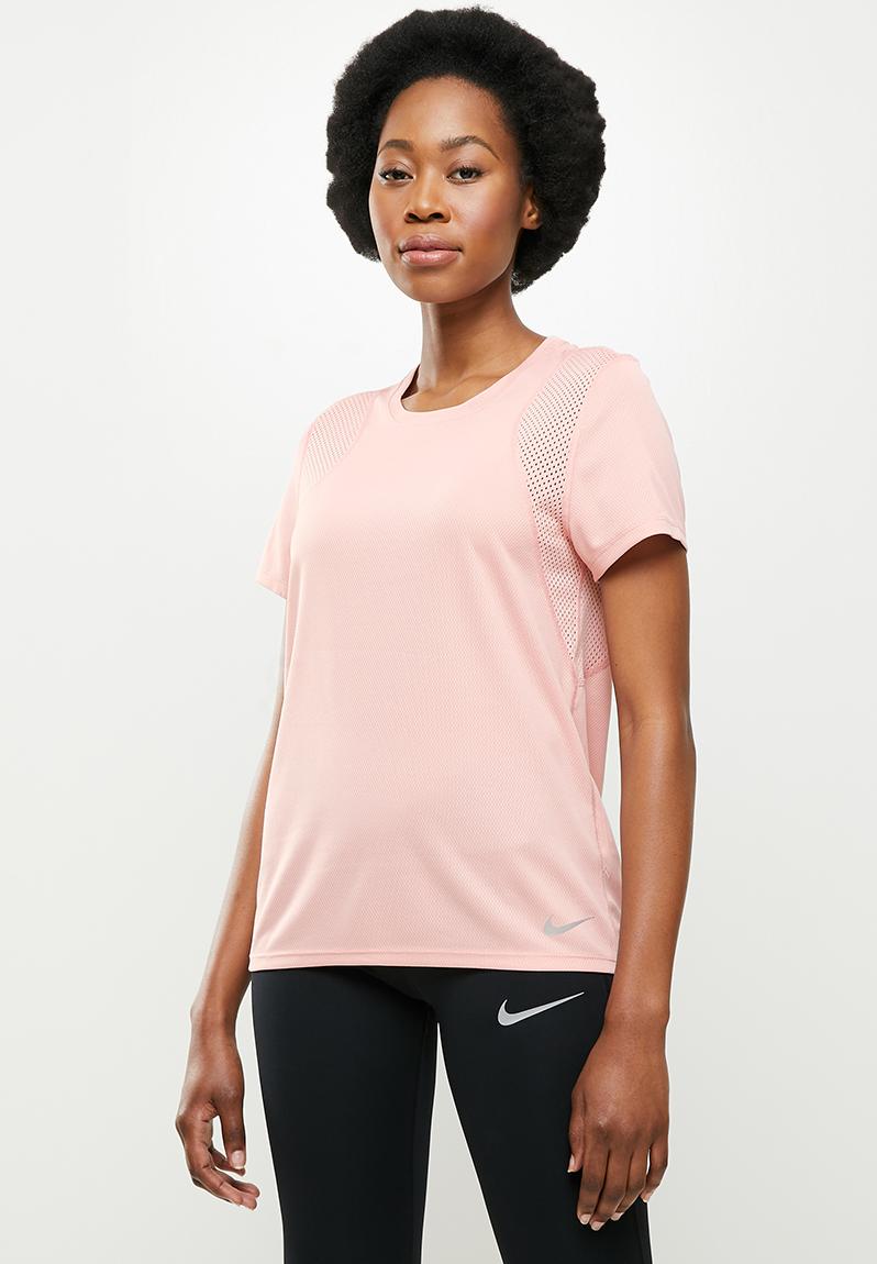 Nk run top ss - pink glaze/reflective silver Nike T-Shirts ...