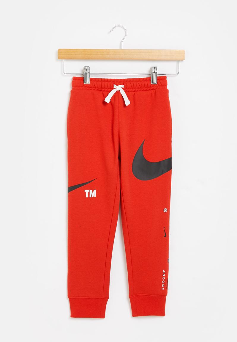 Nkb swoosh jogger - university red Nike Pants & Jeans | Superbalist.com