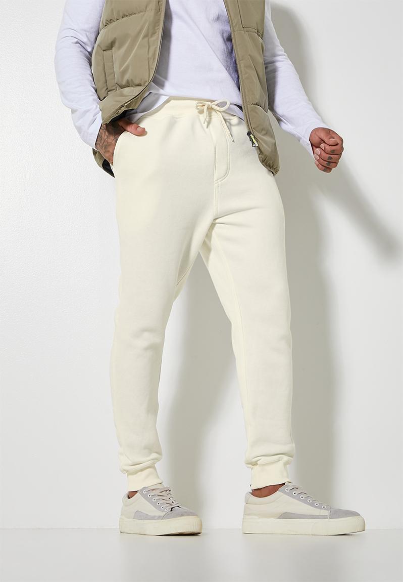 Regular fit basic sweatpant - white Superbalist Pants & Chinos ...