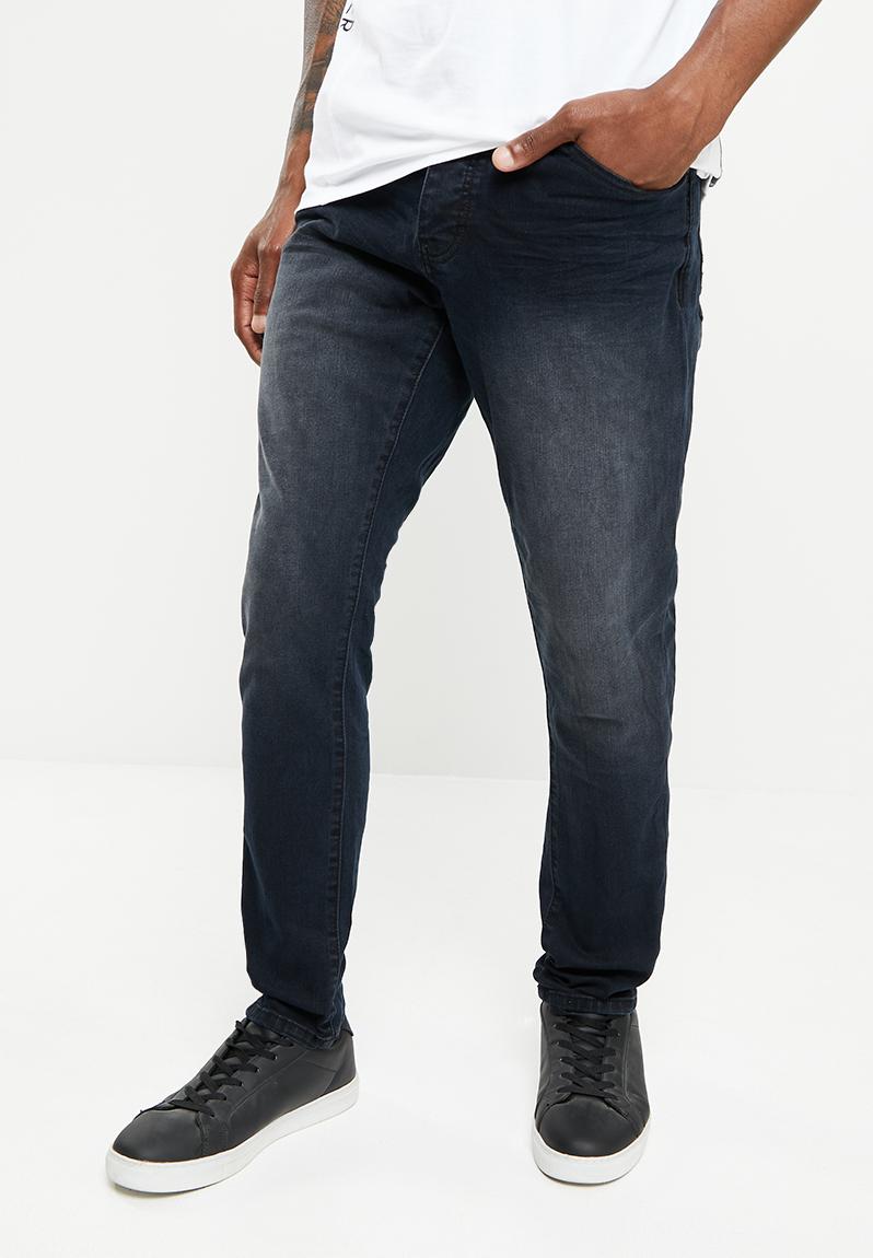 Obsidian Signature Sabre Fit Tapered Jeans - Indigo S.P.C.C. Jeans ...