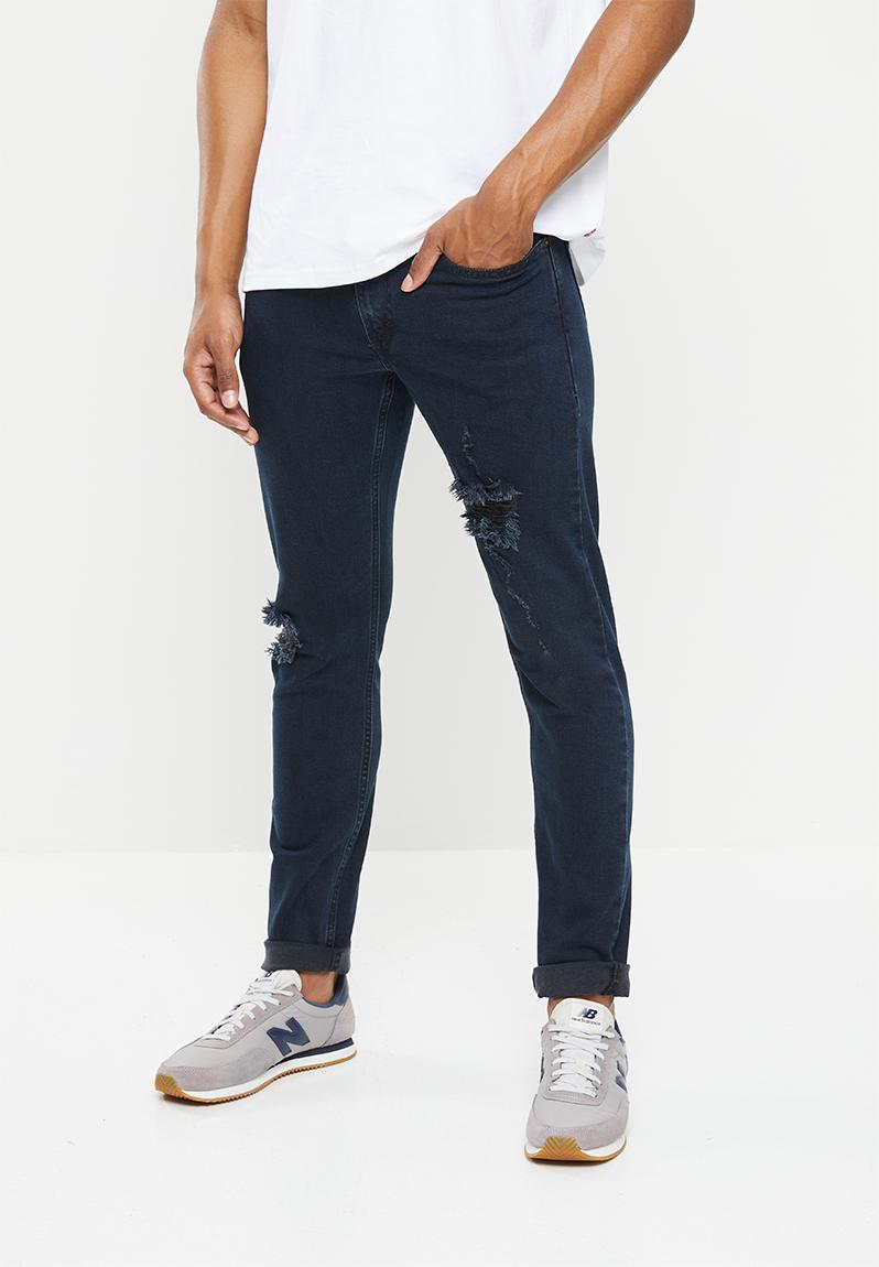 Skinny taper z1474 - dark black destructe Levi’s® Jeans | Superbalist.com