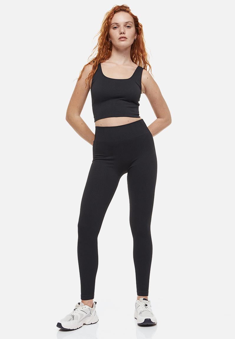 Seamless medium support sports bra dark grey 1092695001 H&M Sports