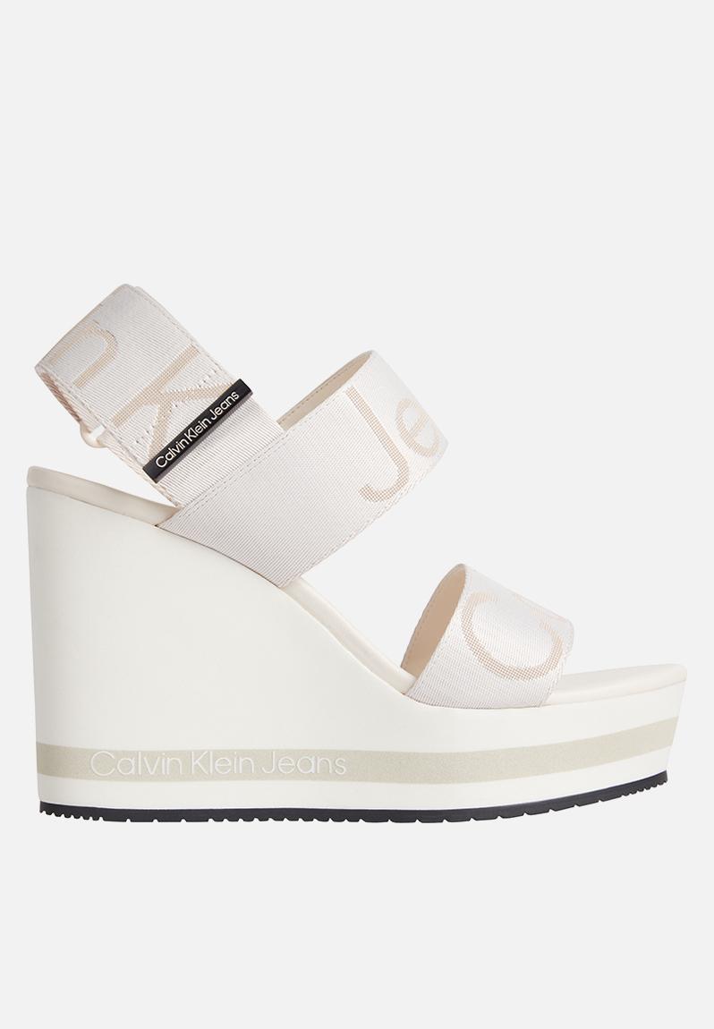 CC CLASSIC WEDGE SANDALS IN WHITE LAMBSKIN