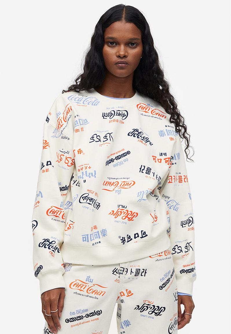 Printed sweatshirt - cream/coca-cola H&M Hoodies & Sweats | Superbalist.com