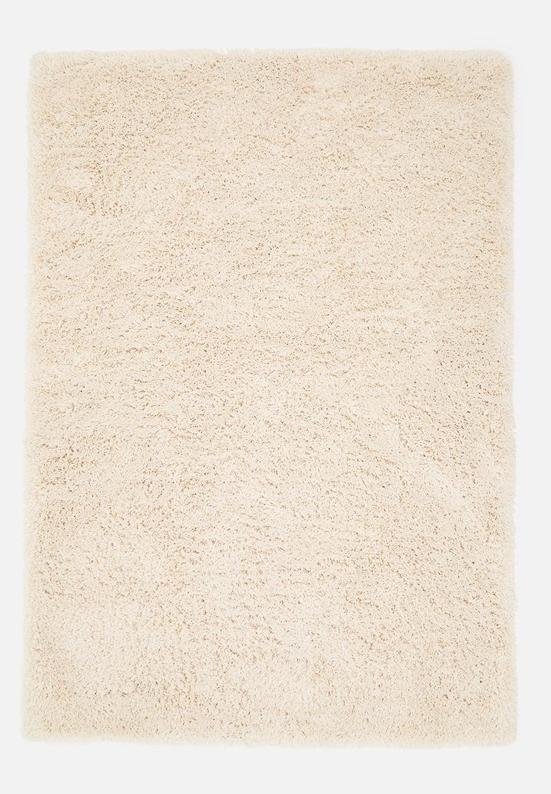 Polyester tufted plain rug - neutral