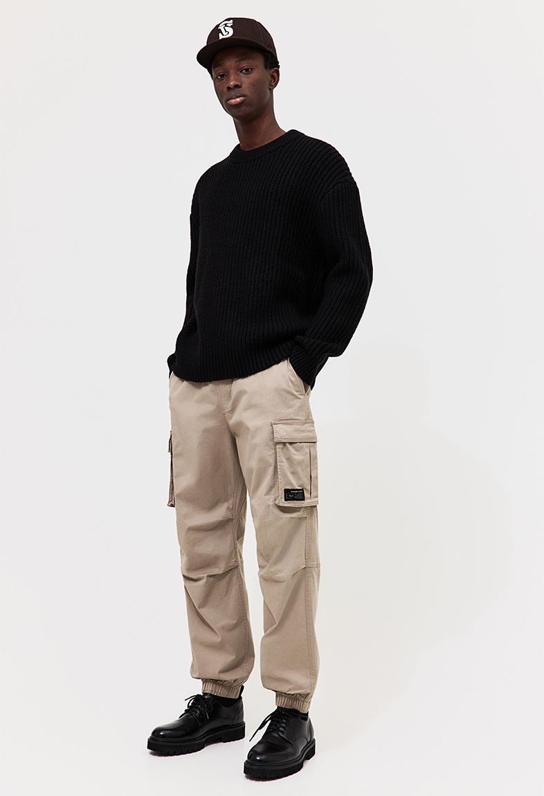 Relaxed fit cotton cargo joggers beige 1073567003 H M Pants Chinos Superbalist