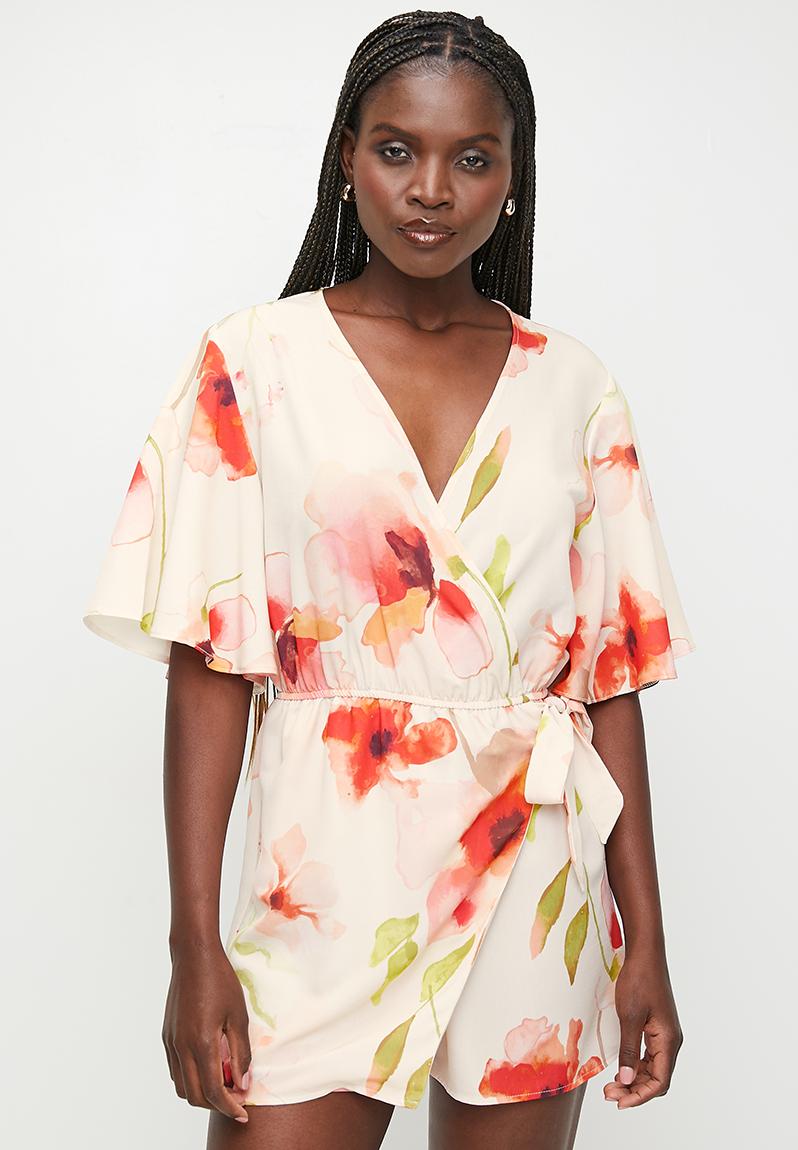 Morgana Playsuit - Tie Shoulder Ruffle Hem Playsuit in Peach