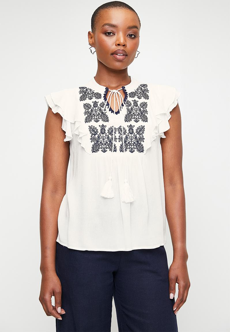 Notch neck ruffle top with embroidery detail - white/navy